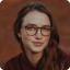 Sarah L, business owner, client testimonial portrait